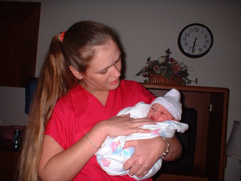 Great Aunt Janet holds the baby.